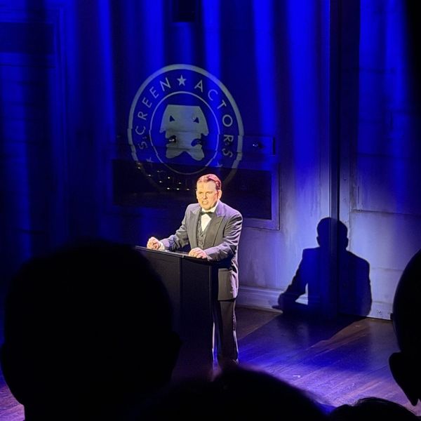 Spot pickup at the podium - Cagney the Musical