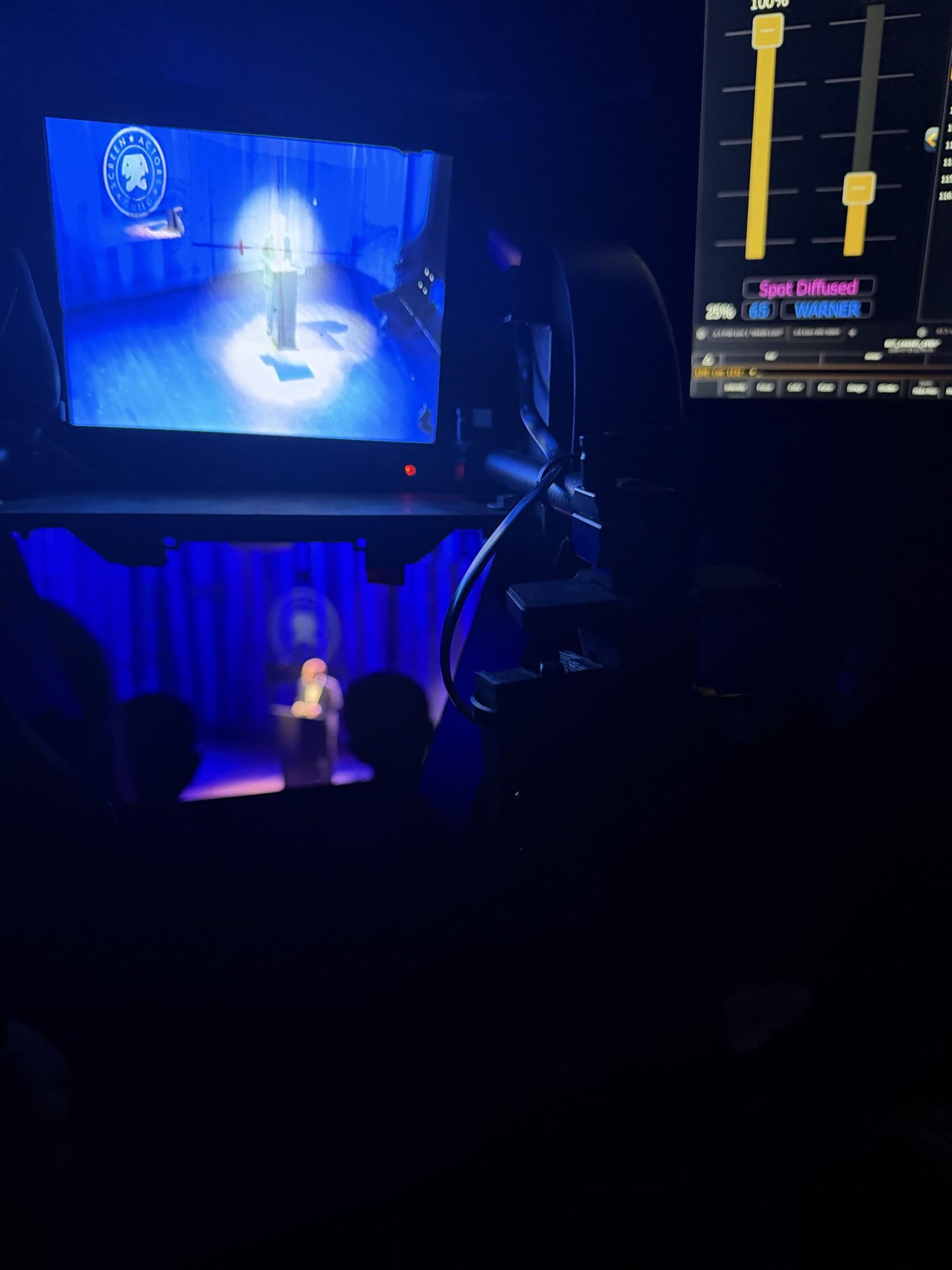 The magic sheet reporting the spot as diffused and named to a character, with the operator's camera monitor alongside